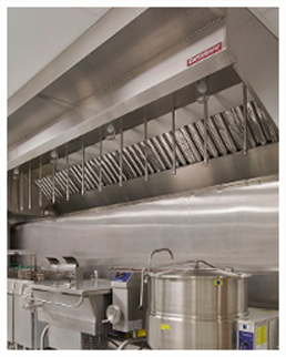 An upward view of aninstallation of the SND-2 series restaurant hood in a commercial kitchen setting.